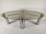 an image of a glass coffee table with chrome legs