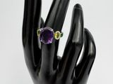 an image of a hand with a ring on it ' s finger
