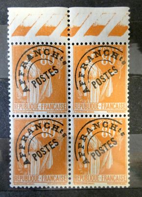 four postage stamps with a picture of a woman on them