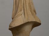 marble bust of a woman wearing a veil
