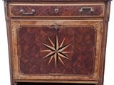 an image of a wooden cabinet with a star design on the front