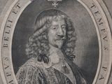 portrait of a man with curly hair and a moustache in an oval frame