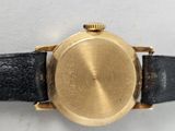 an image of a close up of a watch on a white surface