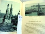 an open book with a picture of a castle on it