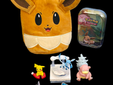 a stuffed animal and other toys on a black background