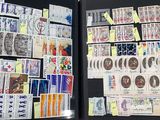 two open books with stamps and stickers on them