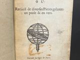 an old book with a picture of a globe on it