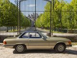 a car that is parked in front of a gate