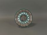 a picture of a decorative plate with a spiral design on it