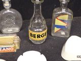 a lot of bottles that are sitting on a table