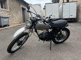 a motorcycle that is parked in a parking lot