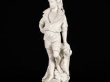 an image of a statue of a man holding a dog