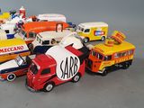 a lot of toy cars that are sitting on a table