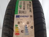 a close up of a tire with a sticker on it