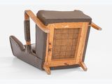 a wooden chair with a black seat and a brown seat