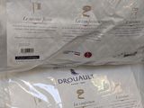 two packages of drouaux sitting on a table