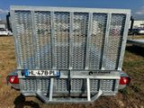 a close up of the back end of a trailer with a number plate on it