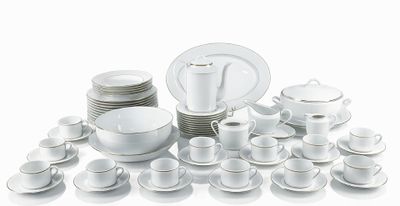 a picture of a white table setting with a lot of plates and cups