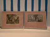 two framed pictures on a shelf with blue and white striped wallpaper