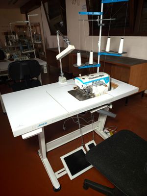 a sewing machine sitting on a table in a room