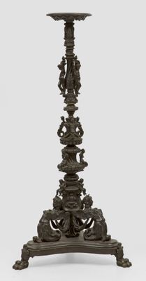 an image of a tall metal candle holder on a white background