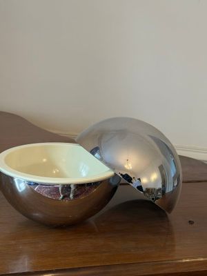 a bowl that is sitting on top of a wooden table
