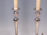 pair of antique silver candlesticks with carved ivory candlesticks