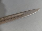 a pair of scissors that are on a table