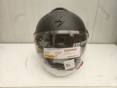 the helmet is black and has a sticker on it