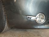 a close up view of a car ' s front bumper