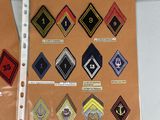 many different types of badges on a piece of paper