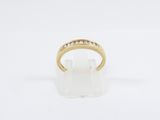 an 18k yellow gold ring set with diamonds