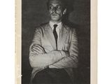 une photo en noir et blanc d'un homme en costume-cravate