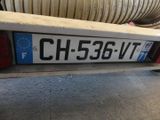 a license plate on the back of a truck