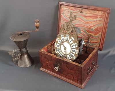 a small wooden box with a clock inside of it