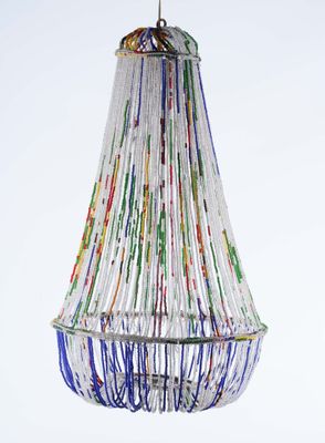 a chandelier made of glass beads hanging from the ceiling