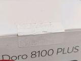 a close up of a white box with a red sticker on it