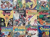 the covers of strange comics are stacked on top of each other