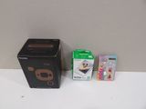 a small box and a smaller box on a table