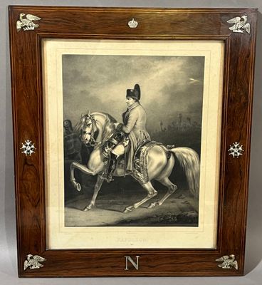 an old picture of a man riding a horse in a wood frame