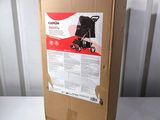 a cardboard box with a picture of a baby stroller inside of it