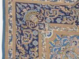 an image of a blue and gold rug with a paisley design