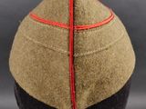 an image of a hat with a red cross on the side of it