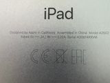 a close up of the back of an apple ipad with the logo on it