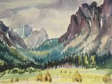 tableau représentant une vue sur une chaîne de montagnes avec une clôture et des balles de foin