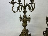 pair of antique brass candelabs with birds and flowers