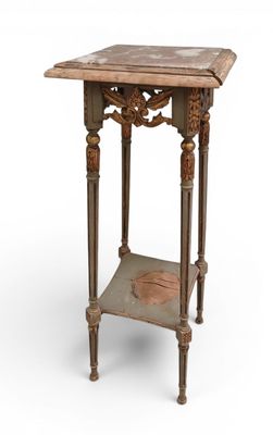 an old wooden table with a shelf on top of it