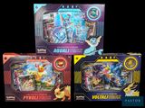 three different types of pokemon toys are displayed in a display case