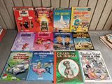 de nombreux livres pour enfants qui se trouvent sur la table