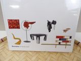 an image of a picture of a box of furniture on a table
